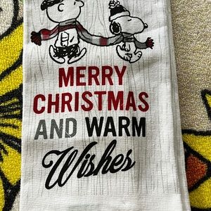 Set of two Peanuts Snoopy Christmas Kitchen Towels. Both are the same pattern.